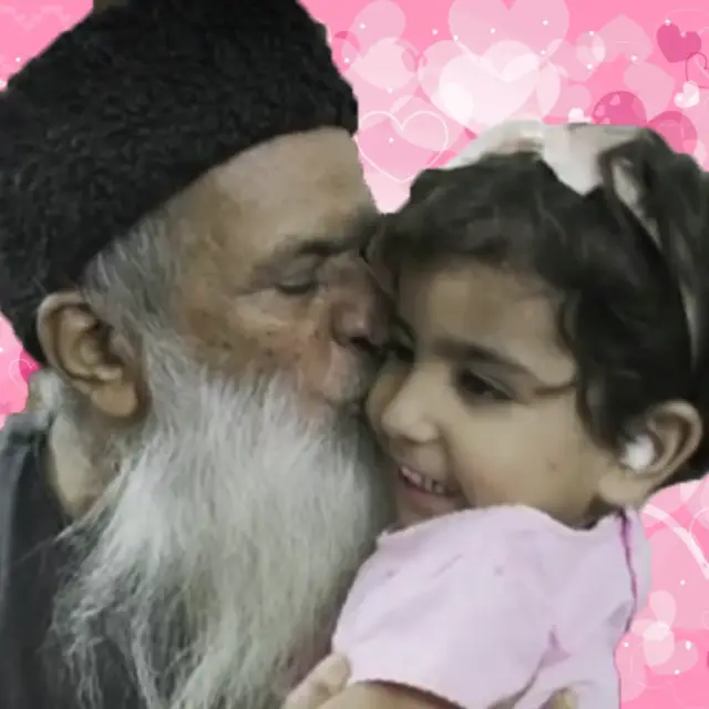 A Great Humanitarian Abdul Sattar Edhi with a Child