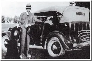 Jinnah Posing Next to His Car, Circa 1920 – Muhammad Ali Jinnah