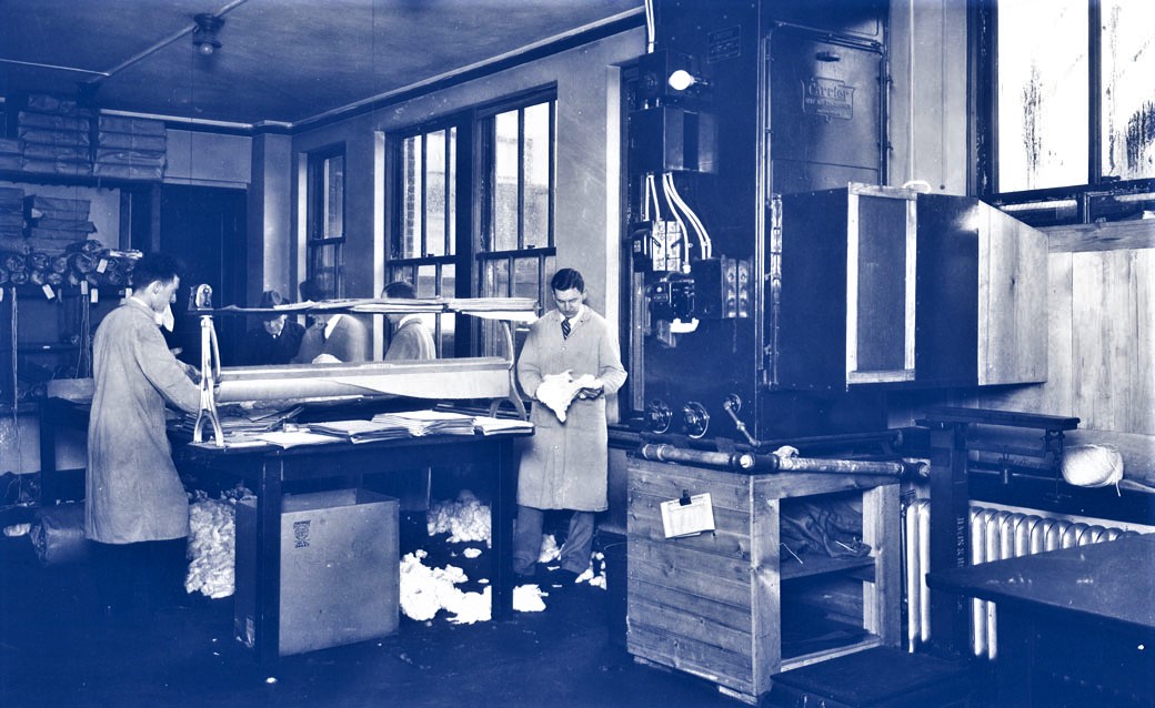 The textile industry was among the earliest and most enthusiastic adopters of modern air conditioning. Here, buyers for New England Cotton work in a clean, efficient environment.