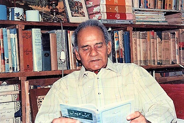 Abdul_Hameed reading a book of Naryal ka Phool (flower of coconut)